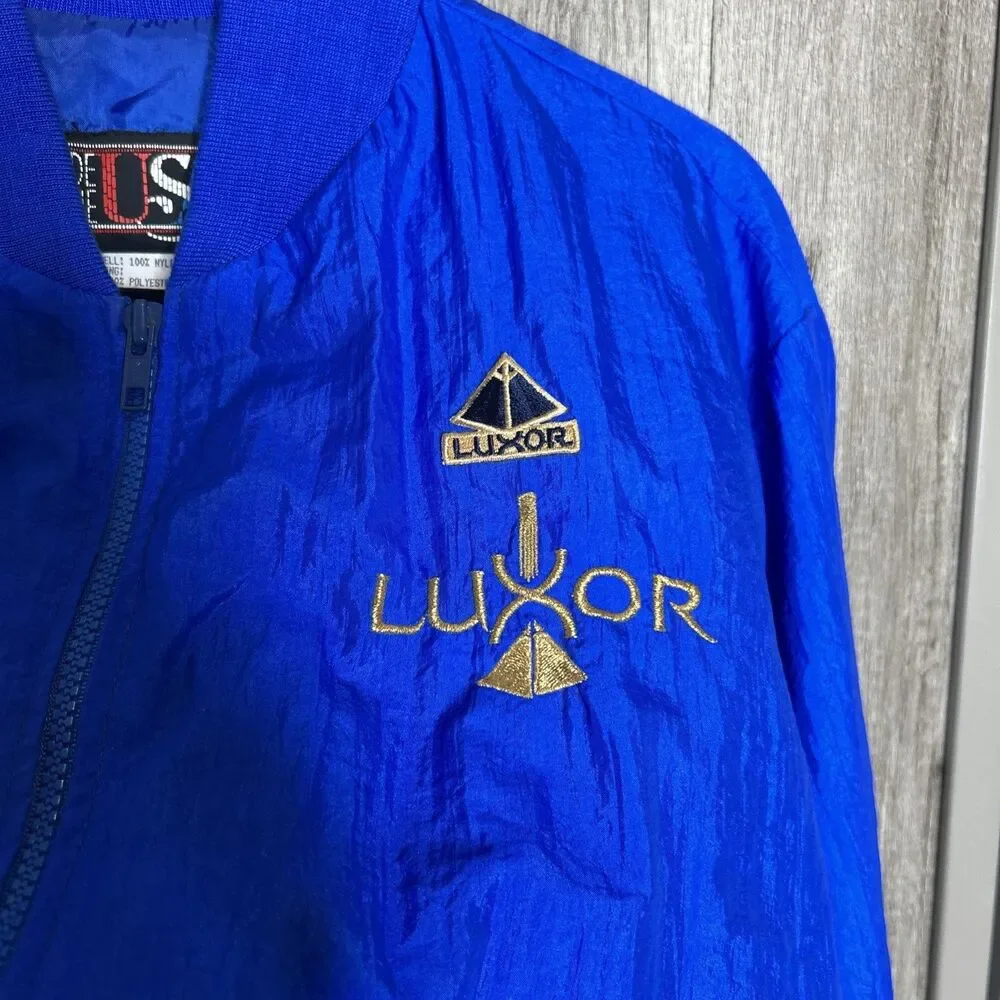 Vintage Luxor Las Vegas Blue Bomber Jacket Gold Embroidered Logo Size M